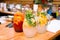 Soft drinks citrus lemonades in large glass jugs