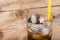 Soft drinks, Cola glass with ice cubes on a wood background.