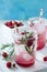 SOFT DRINKS. Refreshing summer drink raspberry with rosemary and ice.