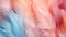 Soft feathers in pastel colors in shades of pink, peach, and blue. Feathers texture background. Use as Backdrops for