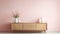 Soft And Feminine Credenza Against Pastel Pink Wall