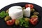 Soft feta cheese served with tomato