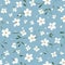 Soft Floral Breeze: Tiny Flower Pattern on Baby Blue Backdrop