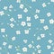 Soft Floral Breeze: Tiny Flower Pattern on Baby Blue Backdrop