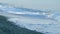 Soft Foamy Waves Washing Pebbled Beach On Sunrise. Shore Landscape On Resort. Static View.
