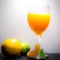 Soft Focus,Close-up shot, squeezed orange juice with lemon juice separating the perfect flavor, citrus scent of lemon, squeezed or