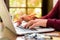 Soft focus Closeup woman hand working on her laptop. Social networking technology concept.