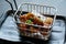 Soft focus of fried pork in the Iron basket on black plate in restaurant