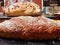 Soft focus of multigrain bread on black plate in restaurant