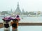 Soft Focus Two Vases of Flowers with Temple of Dawn in Background