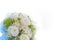 Soft focus white wedding bouquet on white background