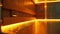 The soft glow of the saunas LED lights adding to the calming and serene atmosphere of the spa.