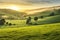 a soft-hued sunrise over rolling green hills