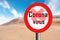 Soft image of a dessert red round stop sign with Coronavirus label. quarantine infectious disease concept