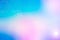 Soft light blue and pink bokeh gradient background