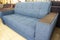 Soft new blue modern comfortable sofa with wooden armrest