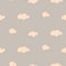 Soft pink and gray baby clouds seamless vector pattern.