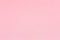 Soft pink paper texture for background usage.