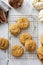 Soft pumpkin cookies on a cooling rack, fall baking