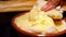 Soft Saint-Felicien cheese in small ceramic pot