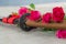 Soft shot of Japanese katana sword with red roses