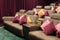 Soft sofas with cushions and small stands for popcorn