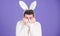 Soft and tender. Guy with long bunny or rabbit ears on violet background. Enjoy tenderness. Cute bunny. Man handsome