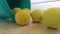 Soft tennis balls falling out of the bucket