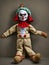 A soft toy vintage doll of an evil clown.