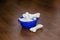 Soft toys - bones for dog in a dish. Artificial chewing toys for puppies.