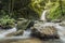 soft water of the stream in the natural park, Beautiful waterfall in rain forest