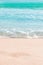 Soft wave of blue ocean on sandy beach. Summer Background. Copyspace