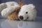 Soft white toys in the form of animals