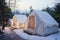 Soft winter focus on mountain resorts white camping tents for visitors