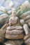 Softfocus background small Buddha image used as amulet.