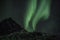 Softly shaped northern Lights beams in Tromso