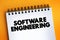 Software Engineering text on notepad, concept background