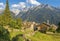 The Soglio village and Piz Badile, Pizzo Cengalo, and Sciora peaks in the Bregaglia range - Switzerland