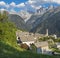 The Soglio village and Piz Badile, Pizzo Cengalo, and Sciora peaks in the Bregaglia range - Switzerland