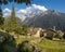 The Soglio village and Piz Badile, Pizzo Cengalo, and Sciora peaks in the Bregaglia range - Switzerland