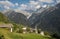 The Soglio village and Piz Badile, Pizzo Cengalo, and Sciora peaks in the Bregaglia range - Switzerland