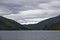 Sognefjord landscape in western Norway with a village in the dis