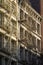 Soho building facades and fire escapes, New York City