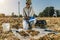 Soil Test. Female Agronomist Taking Notes In The Field