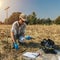 Soil Thermometer. Female Agronomist Measuring Soil Temperature