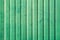 Soiled striped green metal sheet