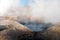 The Sol de la Manana, Rising Sun steaming geyser field high up in a massive crater in Bolivian Altiplano, Bolivia