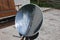 Solar Cooking converted satellite dish Parabolic mirror dish on a stand for solar cooking