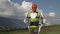 Solar farm worker walking in exoskeleton