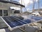 Solar panel of boat in marina in the French West Indies. Solar charging battery aboard a yacht. Close up of plate for photovoltaic